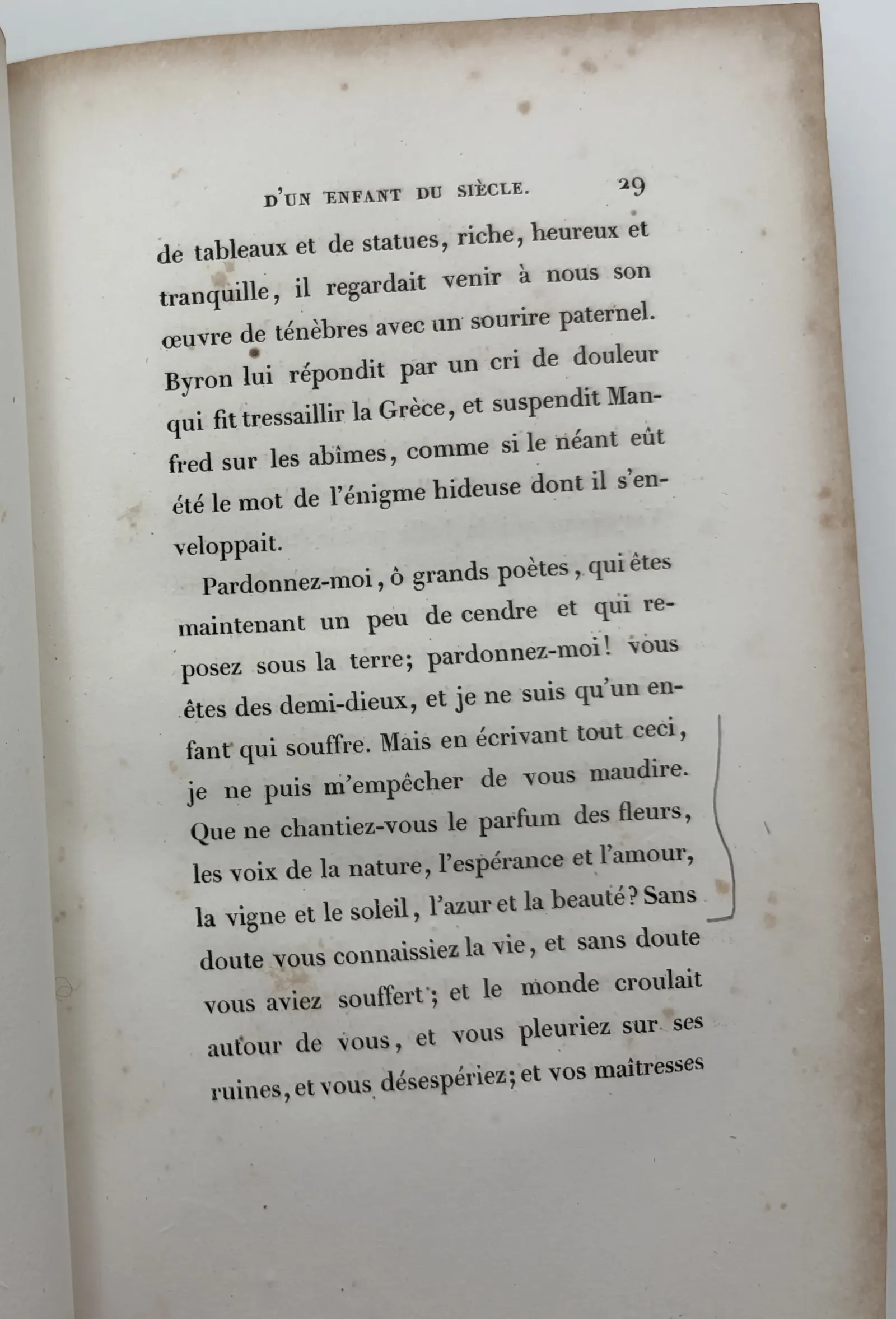 p. 29 — accolade longue, marge droite.