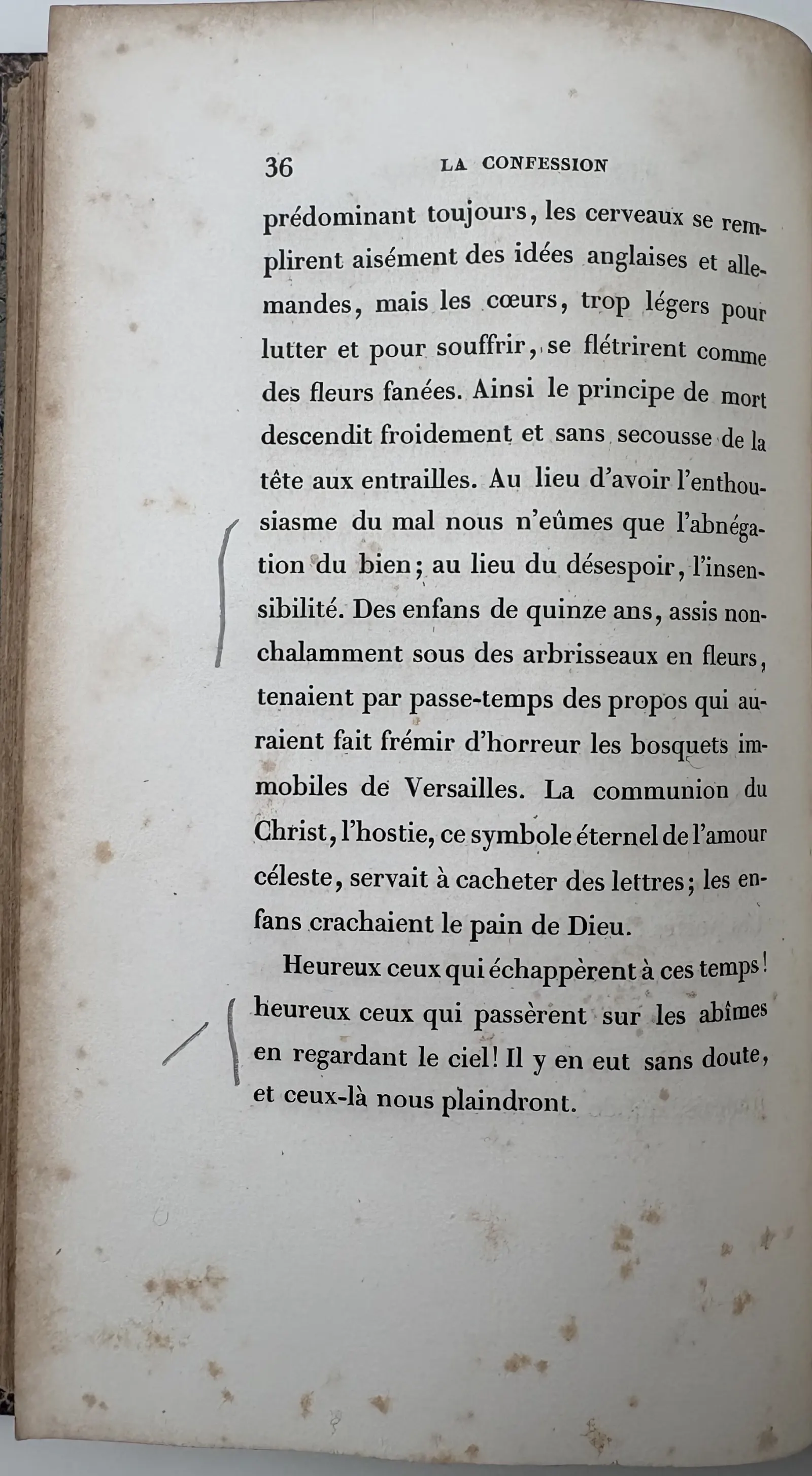 p. 36 — annotation 1 — accolade longue et trait court, marge gauche.
